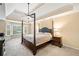 Main bedroom featuring trey ceilings, fan, carpet and lots of natural light at 511 Newburgh Way, Roswell, GA 30075