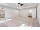 Large main bedroom featuring neutral carpet, a trey ceiling and a ceiling fan at 686 Smokey Quartz Way, Kennesaw, GA 30144