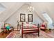 Cozy bedroom under a vaulted ceiling with a chandelier and vintage furnishings at 1762 Nancy Creek Bluff, Atlanta, GA 30305
