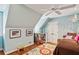Bright bedroom with a vaulted ceiling, featuring hardwood floors and cozy furnishings at 1762 Nancy Creek Bluff, Atlanta, GA 30305