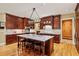 Beautiful kitchen with a large island, marble countertops, and custom cabinetry at 1762 Nancy Creek Bluff, Atlanta, GA 30305