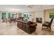 Spacious living room with a cozy fireplace, dining area, and lots of natural light at 1762 Nancy Creek Bluff, Atlanta, GA 30305