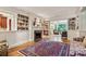 Bright living room featuring built-in bookshelves, fireplace, and open layout at 1762 Nancy Creek Bluff, Atlanta, GA 30305