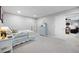Cozy bedroom with a comfortable bed, dresser, and access to living room area at 416 Telfair Way, Canton, GA 30115