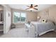 Inviting bedroom with neutral color palette, sunlight filled window, and decorative accents at 416 Telfair Way, Canton, GA 30115