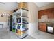 Organized garage with shelving, cabinets, and granite countertop at 416 Telfair Way, Canton, GA 30115