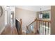 Second story hallway with hardwood floors and natural light at 416 Telfair Way, Canton, GA 30115