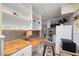 Small kitchen with cabinets, shelving, and a rooster themed decor at 416 Telfair Way, Canton, GA 30115