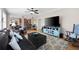 Open living room with hardwood floors, fireplace, and open floor plan at 416 Telfair Way, Canton, GA 30115