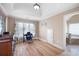 This office space includes hardwood floors, natural light, and en suite bathroom at 416 Telfair Way, Canton, GA 30115