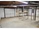 Unfinished basement with concrete floor and exposed ceiling joists at 5535 Beaver Sw Dr, Mableton, GA 30126