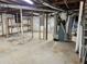 Unfinished basement featuring exposed beams, plumbing, and utilities, ready for customization at 5535 Beaver Sw Dr, Mableton, GA 30126