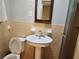 Classic bathroom with a pedestal sink, ceramic tile, and shower-tub combination at 5535 Beaver Sw Dr, Mableton, GA 30126