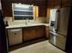 Functional kitchen features a stainless steel refrigerator and ample cabinet space at 5535 Beaver Sw Dr, Mableton, GA 30126