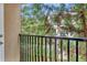 Balcony view overlooking lush greenery from this property at 1850 Cotillion Dr # 3305, Atlanta, GA 30338