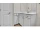 Well-lit bathroom features a white vanity with ample storage and modern fixtures at 1850 Cotillion Dr # 3305, Atlanta, GA 30338