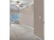 Neutral bedroom featuring ceiling fan and access to private balcony at 1850 Cotillion Dr # 3305, Atlanta, GA 30338