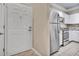 Modern kitchen with stainless steel appliances and white cabinetry, conveniently located near the entrance at 1850 Cotillion Dr # 3305, Atlanta, GA 30338