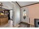 Entryway featuring a front door with oval glass, wood-look floors, and neutral walls at 1370 Cronic Town Rd, Auburn, GA 30011