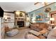 Cozy living room with a stone fireplace and built-in bookshelves at 1370 Cronic Town Rd, Auburn, GA 30011