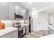 Well-equipped kitchen with modern appliances, subway tile backsplash, and ample storage at 2700 Pine Tree Ne Rd # 2201, Atlanta, GA 30324