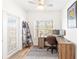 Bright office with a large window, desk, and decor at 2700 Pine Tree Ne Rd # 2201, Atlanta, GA 30324