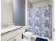 Bathroom featuring a sink with granite countertops, a toilet, and a shower with a blue shower curtain at 332 Hinton Farm Way, Dacula, GA 30019