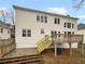 Back exterior showing a raised deck and walkout basement at 4190 Haynes Mill Nw Ct, Kennesaw, GA 30144