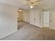 Large bedroom featuring neutral carpet and two windows for ample natural light at 4190 Haynes Mill Nw Ct, Kennesaw, GA 30144