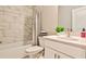 Well-appointed bathroom featuring a bathtub with shower, a modern toilet, and a sleek white vanity at 429 Stagecoach Bnd, Smyrna, GA 30080
