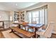 Inviting dining area featuring a large wooden table, comfortable chairs, and ample natural light at 429 Stagecoach Bnd, Smyrna, GA 30080