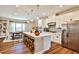 Beautiful kitchen featuring a large island, white cabinets, and stainless steel appliances at 429 Stagecoach Bnd, Smyrna, GA 30080