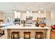 Bright kitchen with white cabinetry, a spacious island, pendant lighting, and stainless steel appliances at 429 Stagecoach Bnd, Smyrna, GA 30080