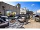 Spacious rooftop terrace with comfortable seating, outdoor dining area, and a built-in barbeque grill at 726 Edgewood Ne Ave, Atlanta, GA 30307