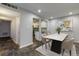 Open dining area with modern table and chairs, stylish decor, and slate flooring at 80 Adrian Pl, Atlanta, GA 30327