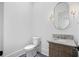 Chic powder room with marble countertop and decorative lighting at 819 Loridans Ne Dr, Atlanta, GA 30342