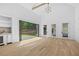 Living room with wet bar and large glass doors opening to the backyard at 819 Loridans Ne Dr, Atlanta, GA 30342