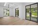 Open living space with hardwood floors, recessed lighting, and exterior views at 819 Loridans Ne Dr, Atlanta, GA 30342