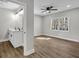 Bedroom featuring a ceiling fan, and ensuite bathroom at 556 Holly Nw St, Atlanta, GA 30318