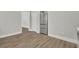 Kitchen area with stainless steel refrigerator and laminate flooring at 556 Holly Nw St, Atlanta, GA 30318