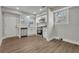 Kitchen with white cabinets, quartz countertops and stainless steel appliances at 556 Holly Nw St, Atlanta, GA 30318