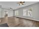 Spacious living room with hardwood floors, neutral paint, and plenty of natural light at 556 Holly Nw St, Atlanta, GA 30318