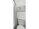 Bathroom with modern fixtures and floral wall decor at 7256 Attache Way, Riverdale, GA 30296