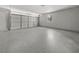 View of the garage with neutral paint, trim, and door at 7256 Attache Way, Riverdale, GA 30296