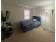 Cozy bedroom with carpet, neutral walls, and a bright window at 1195 Stony Pt, Grayson, GA 30017