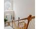 An aerial view of the entryway with hardwood floors, a chandelier, and large arched windows at 3620 Highpoint Rd, Cumming, GA 30041