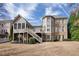 Backyard with a porch area and stairs at 5029 Tarry Glen Dr, Suwanee, GA 30024