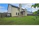 Enjoy this backyard with mature trees, a fence, and a patio, perfect for outdoor living and entertaining at 207 Birchwood Dr, Loganville, GA 30052