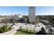 Scenic aerial view showcases the building's location within a vibrant cityscape with mature trees and landscaping at 2500 Peachtree Nw Rd # 605S, Atlanta, GA 30305