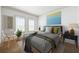 Stylish bedroom with a comfortable bed, neutral decor, and natural light at 2500 Peachtree Nw Rd # 605S, Atlanta, GA 30305